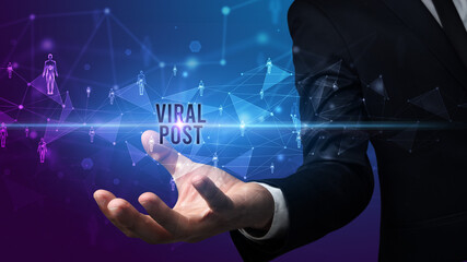 Hand holding social media related inscription