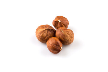 Hazelnuts on the white background