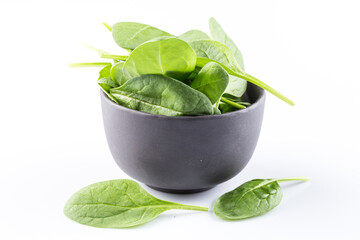 Green spinach on a white background