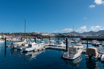 Panoramic view of the pretty port of Playa Blanca, in Yaiza, Lanzarote island, Spain.