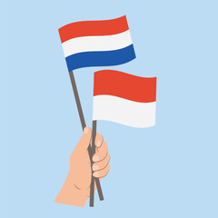 Flags of the Netherlands and Monaco, Hand Holding flags