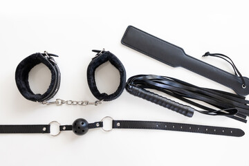 leather accessories for adult sexual games. Toys for BDSM, spanking devices. Spanking and punishment concept. 