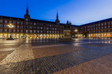 Madrid, Spain 08-06-2021 the beautiful and vibrant plaza mayor in the heart of Madrid during blue...