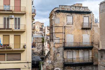Contrast street view, old versus new buildings in historic quarter of Palermo, Sicily, Italy