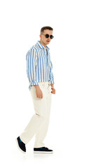 happy confident man in sunglasses and blue striped shirt