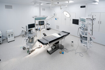 Empty operating room in a hospital Interior of an operating room in a clinic with modern medical equipment
