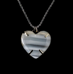"Handmade with love: the white onyx heart charm"