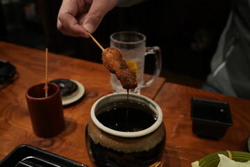 Fototapeta na wymiar Japanese Food, Kushikatsu or Kushiage, Deep Fried Skewer, Famous Food in Osaka - 日本料理 大阪 串カツ