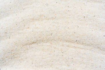 White sand background, macro close up of white sand or abstract white sand wave texture.