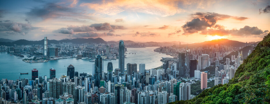 Victoria Harbour panorama at sunrise seen from Lugard Road, Hong Kong, China