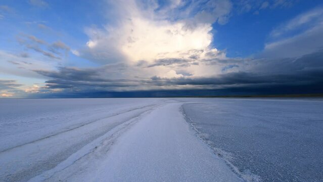 Time lapse of cloud over salt at El'ton lake. Beautiful summer landscape with cloudy sky.