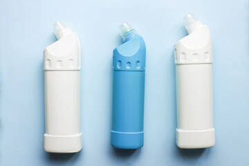 Toilet cleaner mockup. Flat lay cleaning products on blue background