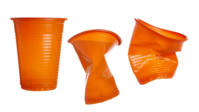 Set wrinkly orange plastic cups isolated on white background, clipping path