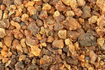 Frankincense resin as background, top view. Aromatic yellow resin. Sudanese Frankincense tree.