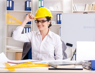 Female architect working in the office