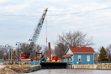 River Clean-up Barge In The Fox River Lock In De Pere, Wisconsin, In Winter