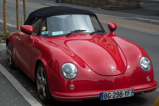 Colmar - France - 30 April 2023 - Front view of red pgo roadster car parked in the street