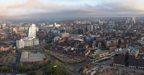 Fototapeta na wymiar Aerial panorama of Leeds cityscape skyline with an early morning sunrise