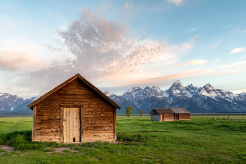 Fototapeta premium Mormon Row in Jackson Hole, Wyoming on a partially cloudy day