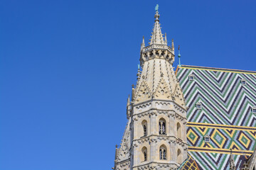 Tower of St. Stephen's Cathedral in Vienna against the blue sky
