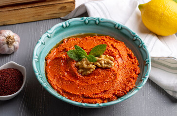Traditional delicious Turkish appetizer, Muhammara, healthy walnut and roasted red bell pepper dip