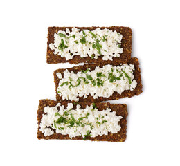 Tasty cottage cheese and rye bread on white background