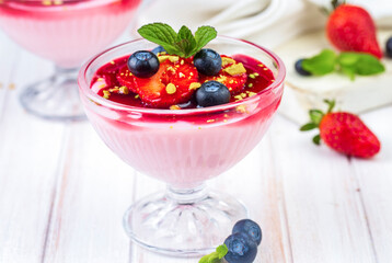 Strawberry Cream Dessert with some blueberries. Delicious strawberry pudding.