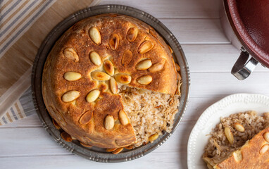 Turkish Perde Pilavi. Drape pilaf with chicken, almond and raisin. A local flavor Rice from Siirt region (Turkish name; Siirt perde pilavi)