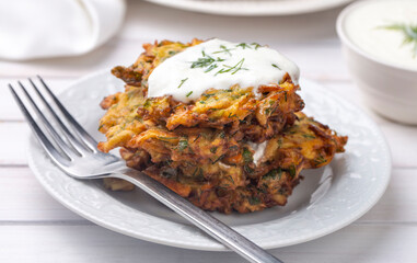 Mucver. Traditional Turkish Zuccini Mucver. Mucver is a Turkish fritter or pancake, made from grated zucchini.