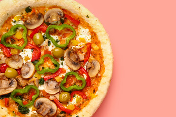 Vegetable pizza on pink background