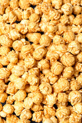 Crispy popcorn as background, closeup