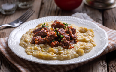 Turkish Food Hunkar Begendi made with Eggplant and Meat.
