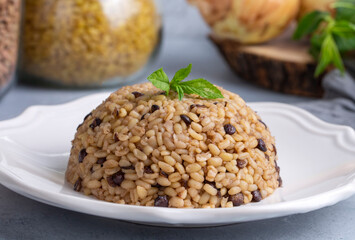 Traditional delicious Turkish foods; bulgur pilaf with green lentils (Turkish name; yesil mercimekli bulgur pilavi)