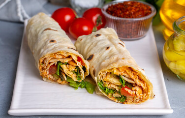 Pita bread lavash roll chicken doner kebab and fresh vegetables - Durum Chicken Doner Kebab
