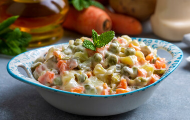 Russian salad Olivier with mayonnaise and egg served (Turkish name; Rus salatasi)