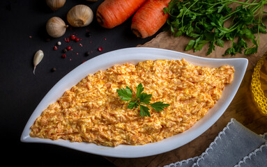 Traditional delicious Turkish foods; Fresh carrot salad with garlic yogurt in bowl. ( Turkish name; havuc tarator)