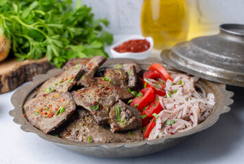 Traditional Turkish Liver kebab cuisine. Leaf Liver spicy. Delicious turkish ciger. (Turkish name; yaprak ciger)