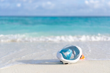 Snorkeling mask on an empty beach in the Maldives