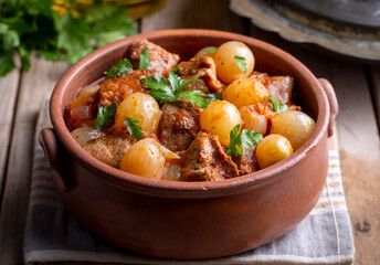 Traditional Greek dish of beef stifado in a sauce. Meat stew, onion stew. Turkish name; sogan yahni or et yahni