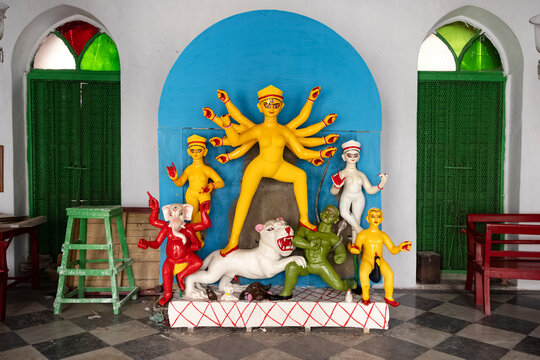 Incomplete Goddess Durga idol at the Thakur Dalan or Family Temple of a old Zamindar or Jamindar house, few days before the Durga Puja festival inKolkata, West Bengal, India.