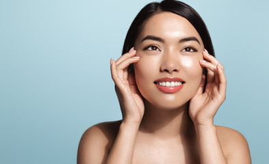 Skincare and women beauty. Young asian woman applies c serum, rejuvenation cream, hydrating...
