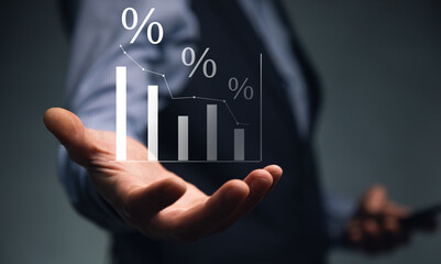 Interest rate and dividend concept, Businessman is calculating .