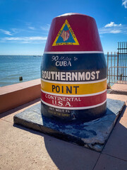 Concrete buoy at Southernmost Point landmark on a beautiful day, Key West, Florida, USA.