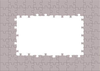 A jigsaw puzzle has an opening in the middle to create a frame for art, text or headlines. This illustration is on a transparent background layer.