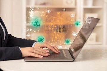 Doctor working on laptop with healthcare concept