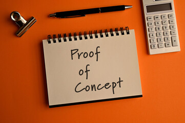 There is notebook with the word Proof of Concept.It is as an eye-catching image.