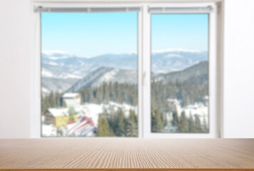Fototapeta premium Empty wooden surface against window indoors. Space for design
