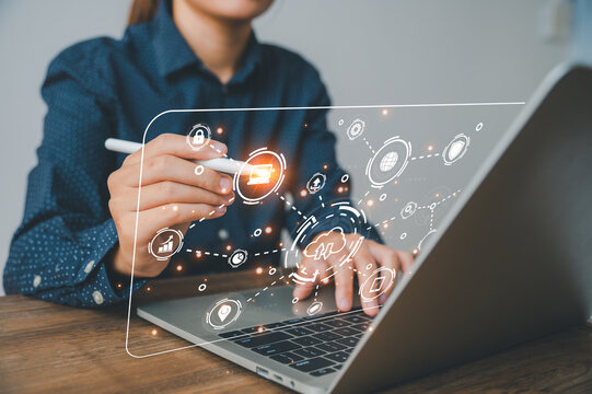 Hand holding pen touching computer infographics and technology icons related to data collection such as passwords, banking information. ,personal information
