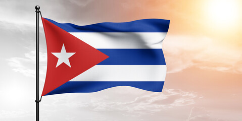 Cuba national flag cloth fabric waving on beautiful sky grey Background.