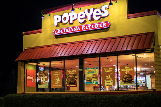 Popeyes fried chicken restaurant at night